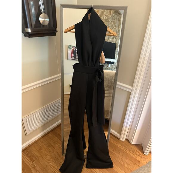 PrettyLittleThing black BLACK TEXTURED CROSS HALTER TIE WIDE LEG JUMPSUIT Size 0 - Picture 4 of 7
